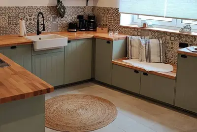 Image de The Polly vacation home is a small, cozy townhouse