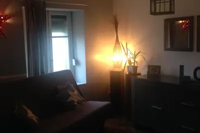 Image de Chambre double dans maison donnant sur un horizon de nature.