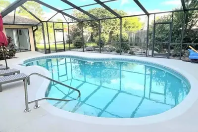 Image de 6 Beds / Pool / Grill / Billiards / Tampa