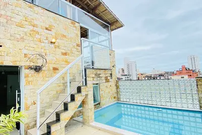 Image de Triplex in Enseada with private pool