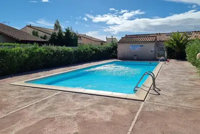 Image de Jolie Maison dans résidence avec piscine l'été. Proche de la plage et commerces