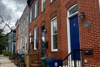 Cozy Historic Brick Exposed Town house with Rooftop Deck overlooking Balt Harbor