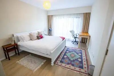 Image de Bright & Cozy Apartment with Gym & Pool
