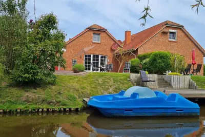 Image de Wunderschönes Ferienhaus mit Eigenem Tretboot