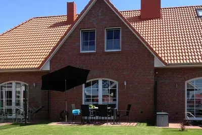Image de Ferienhaus mit Wasserblick