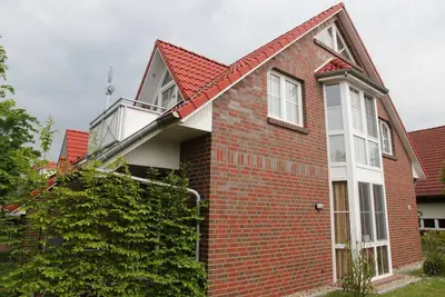 Image de Apartment (70sqm) for 4 persons with garden and sep. Guest Wc in a quiet location