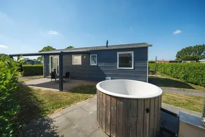 Image de Treat yourself to a holiday home with a private hot tub.
