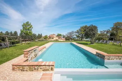 Image de Chalet \"Cigno\" avec piscine partagée et Wi-Fi