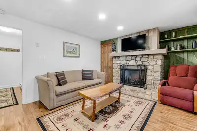 Image de Inviting condo with skiing nearby, mountain view, and covered porch