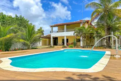 Image de Casa com piscina em Itacimirim/Ba