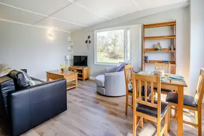 Image de Lovely lodge overlooking the fisheries lake, great for a family break in the Cambrian Mountains.
