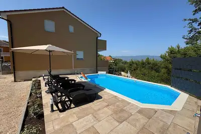 Image de Maison de vacances avec deux chambres et climatisation