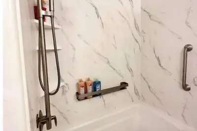 Image de Oasis backyard. Pool and heated spa.