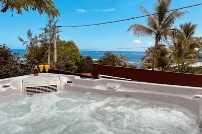 Image de Bungalow Jacuzzi - pieds dans l'eau