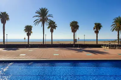 Image de Appartement en bord de mer avec piscines, jardin et parking, accès direct plage de Torredembarra