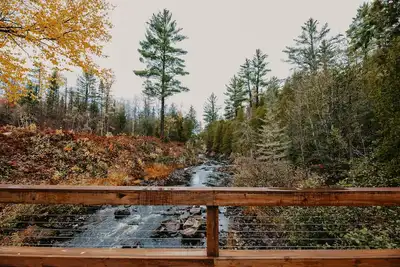 Image de Atv-Snowmobile Trail, Large home, sits on the peshekee river. sleeps 22 people.