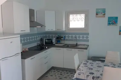 Image de Poolfront townhouse just minutes from the sea