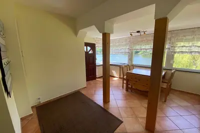 Image de Holiday apartment \"Seewohnung\" in a holiday home - directly on the lake