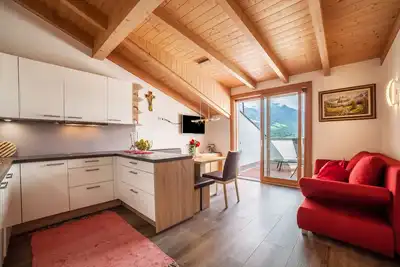 Image de Appartement \"Sagschneiderhof Red Delicious\" avec vue sur les montagnes, jardin et Wi-Fi.