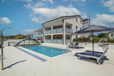 Image de Joli appartement pour 6 personnes avec climatisation, Wifi, piscine, Tv et terrasse