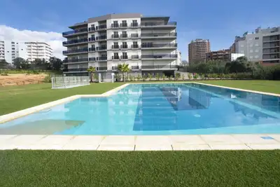 Image de Joli appartement pour 4 personnes avec Wifi, climatisation, piscine, Tv et terrasse