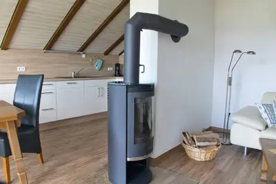 Image de Ferienwohnung für bis zu Drei Personen mit Kachelofen und Balkon