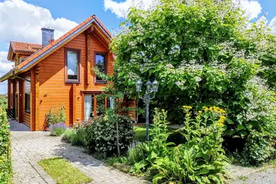 Image de Cozy log cabin by the forest with large garden
