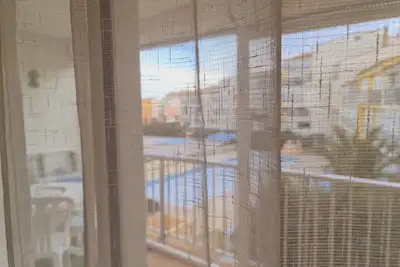 Image de Appartement près de la plage avec piscine