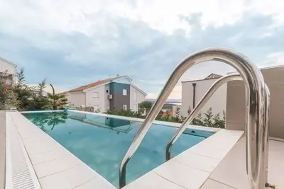 Image de Appartement de vacances avec utilisation de la piscine