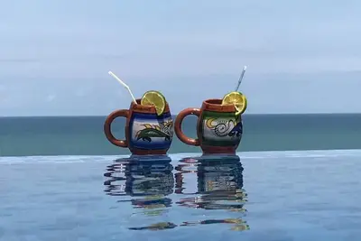 Beachside Getaway: Pool, Cliffside Views, and Direct Beach Access