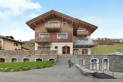 Image de Appartement 'Baita Valandrea 0' avec vue sur les montagnes, jardin partagé et Wi-Fi