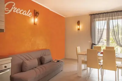 Image de Appartement \"Grecale\" avec terrasse privée, Wi-Fi et climatisation.