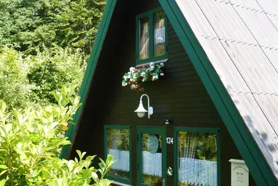 Ferienpark Twistesee, cozy vacation home with sunbathing lawn and lake view