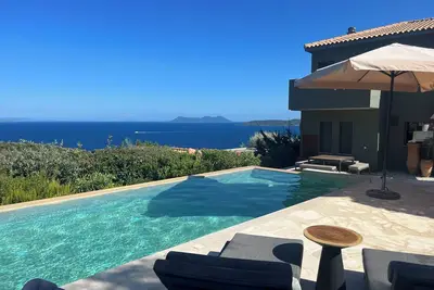 Image de Villa Arkoudi avec vue sur la mer, table de ping-pong, terrain de pétanque