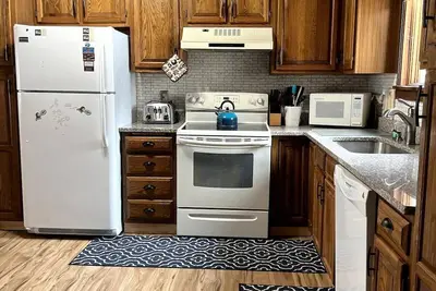 Image de Cozy townhome off Access road - walk to restaurants- quick drive to Killington