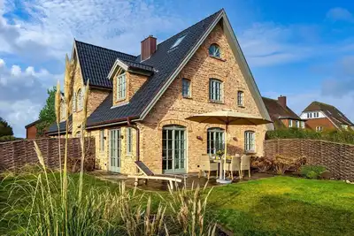 Image de Haus Westerländer Perle - The \"Westerländer Perle\" is a true Sylt