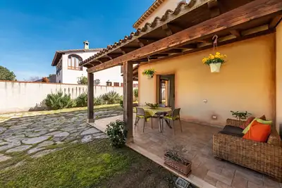 Image de Maison de vacances « Girasole » avec terrasse privée, jardin et climatisation