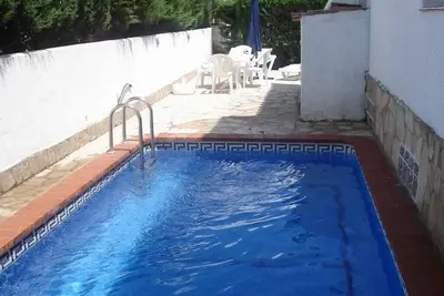 Image de Maison de vacances \"Pino Alto\" avec vue sur les montagnes, piscine privée et climatisation.