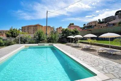 Image de Maison de vacances 'Il Gattino Di Porto Appartamento 5' avec piscine partagée