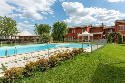Image de Maison de vacances 'Calla' avec piscine partagée, Wi-Fi et climatisation.