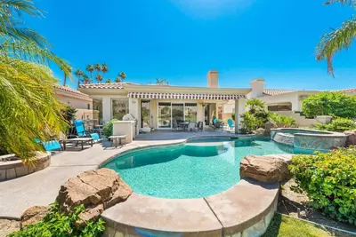 Image de Ultimate West facing Pga West Home with Heated Salt Water Pool! !