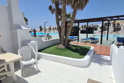 Appartamento con Piscinas y Vistas al mar