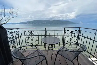 Image de Vacation apartment directly on the lake