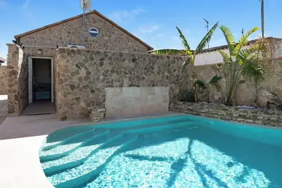 Image de Maison de vacances 'El Cortijo de Claudia - Adults only' avec piscine partagée et Wi-Fi