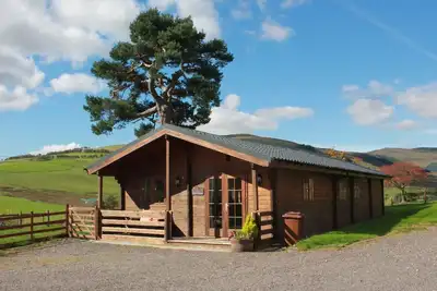 Image de Stunning log cabin Berwyn with private Hot Tub