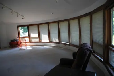 Unique Rounded Wood House With Stunning Architectural Design