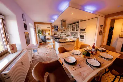 Image de At the foot of the Alps ❖ 10 minutes from Salzburg ❖ Garden ❖ Sauna ❖ Home cinema
