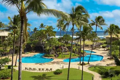 Image de Oceanfront Kauai Beach Resort 75 foot waterslide, 4 pools, Jacuzzis, restaurants