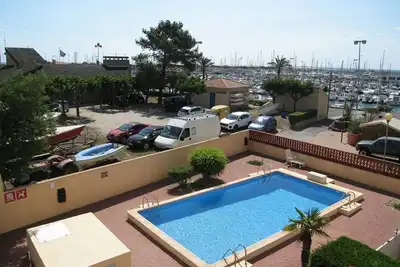 Image de T2 Port St Cyprien Piscine, Clim, Parking, Animaux Ok