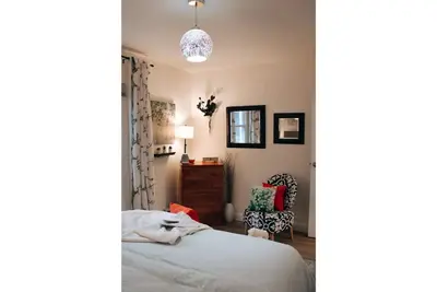 Image de Unique A-Frame Cottage Steps away from the Beach!